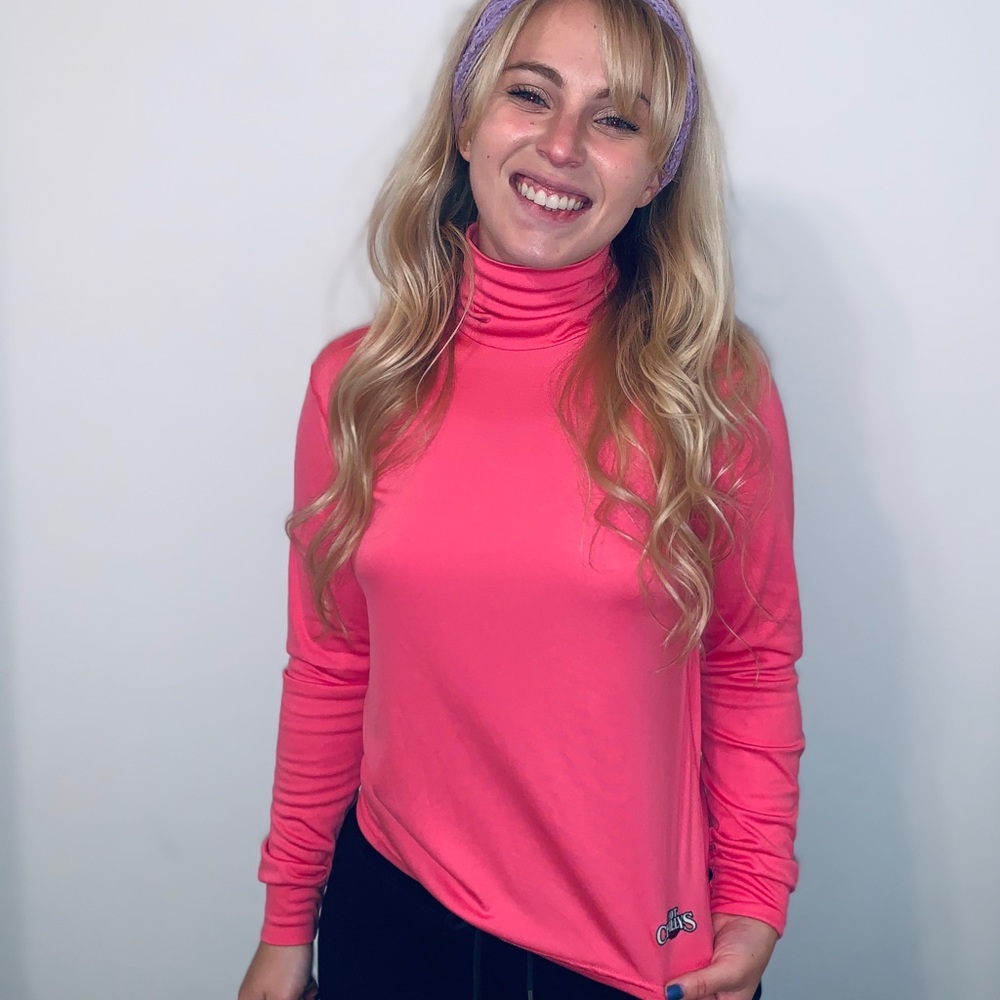 athletic pink turtleneck